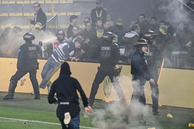 Nantes toulouse match halted after pitch invasion
