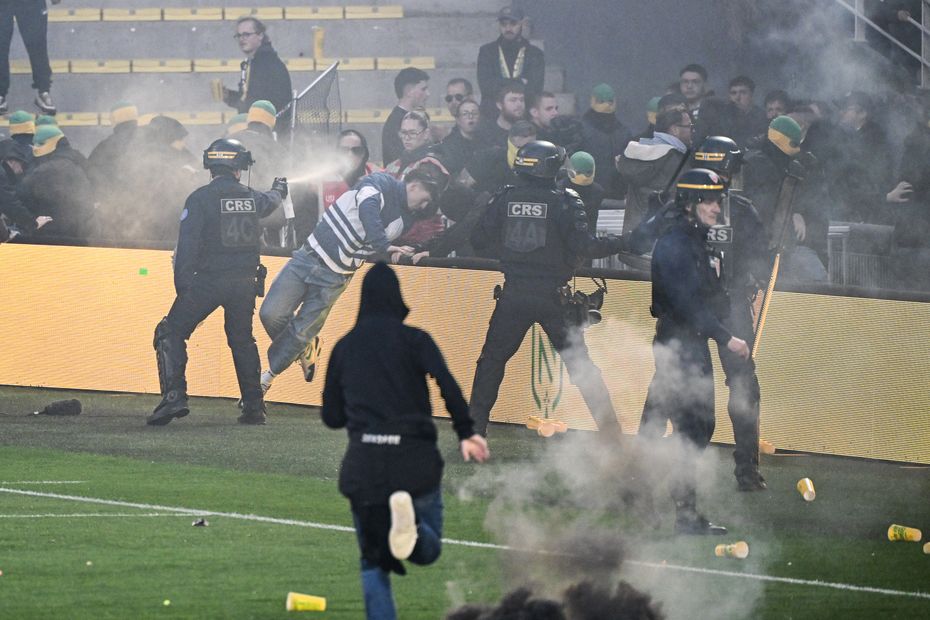 Fc nantes supporters condemn pitch invasion after ligue 1 match disrupted