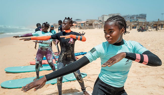Surfing in Senegal empowers girls to return to school