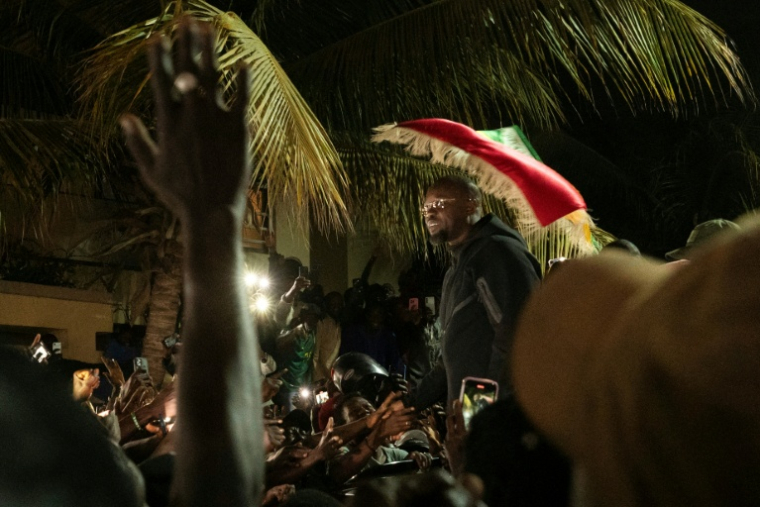 Ousmane Sonko greeted by supporters