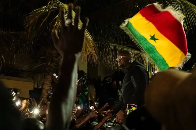 Ousmane Sonko greeted by supporters upon returning home in Dakar on May 23, 2026
