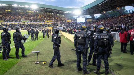 Police presence on the pitch during the abandoned Nantes vs Toulouse match