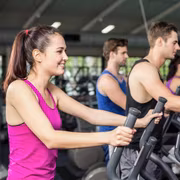 The elliptical trainer isn’t a real bicycle; it offers numerous benefits, including working the legs and arms. © WavebreakMediaMicro, Fotolia
