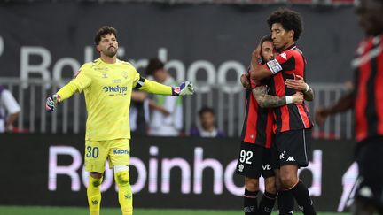 Nice players celebrating after securing Ligue 1 survival