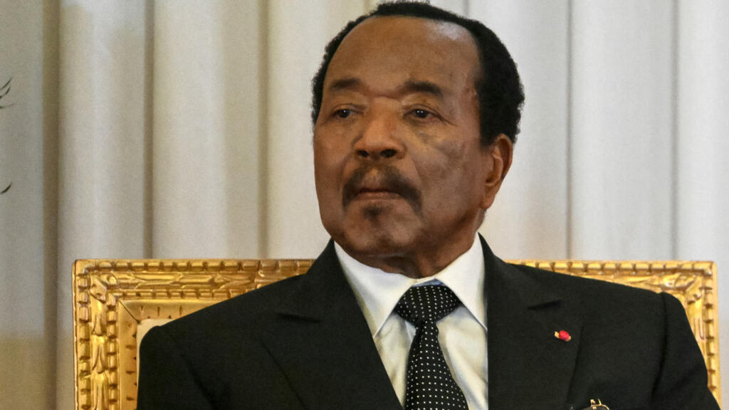 Cameroon's President Paul Biya observes Pope Leo XIV (off-camera) delivering a speech at the presidential palace in Yaoundé on the third day of an 11-day apostolic journey across Africa, April 15, 2026.