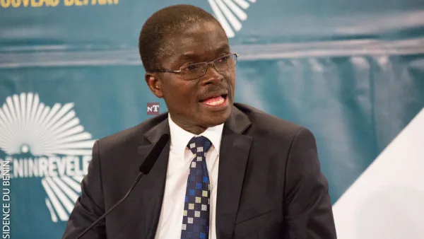 Lazare Maurice Sehouéto speaking at a public forum in Cotonou