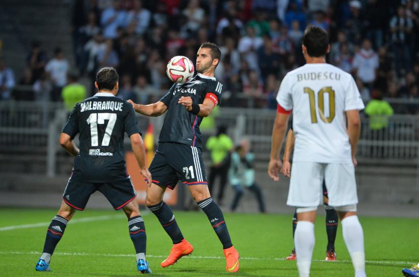 Steed Malbranque and Maxime Gonalons playing for Lyon against Astra Giurgiu on August 21, 2014.