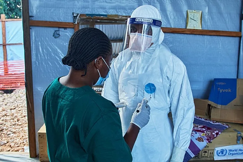 Health workers discuss patient care at a medical center in Bunia, July 2026
